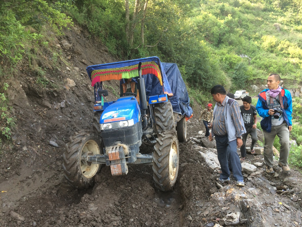 Photo 5 tractor stuck in mud.jpg